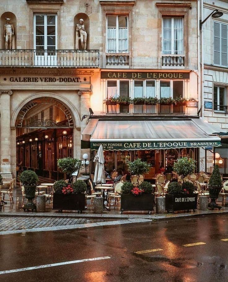 Parisian café terrace with patrons enjoying coffee